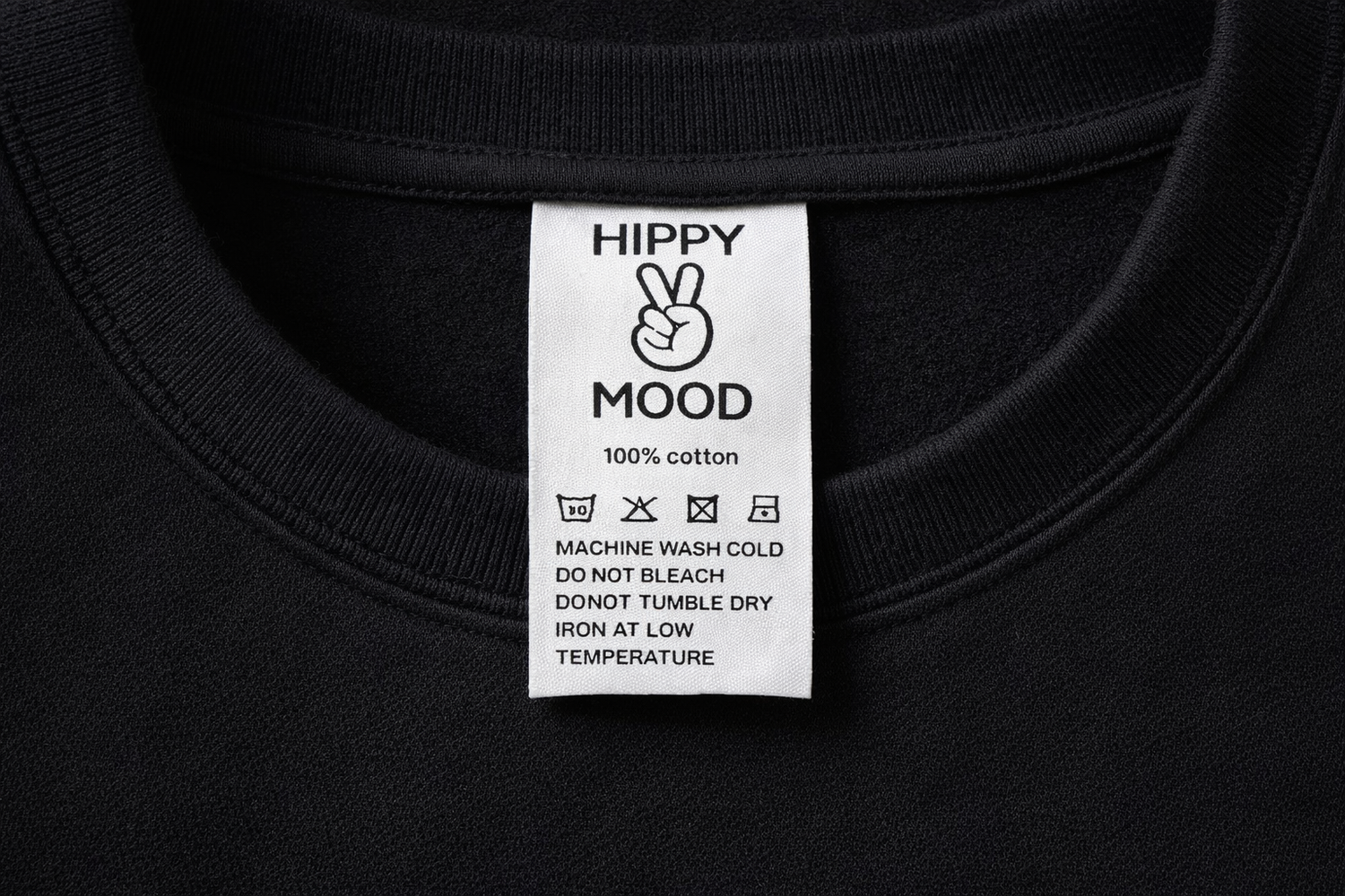 Black t-shirt with a white label displaying 'Hippy Mood' brand on a black background